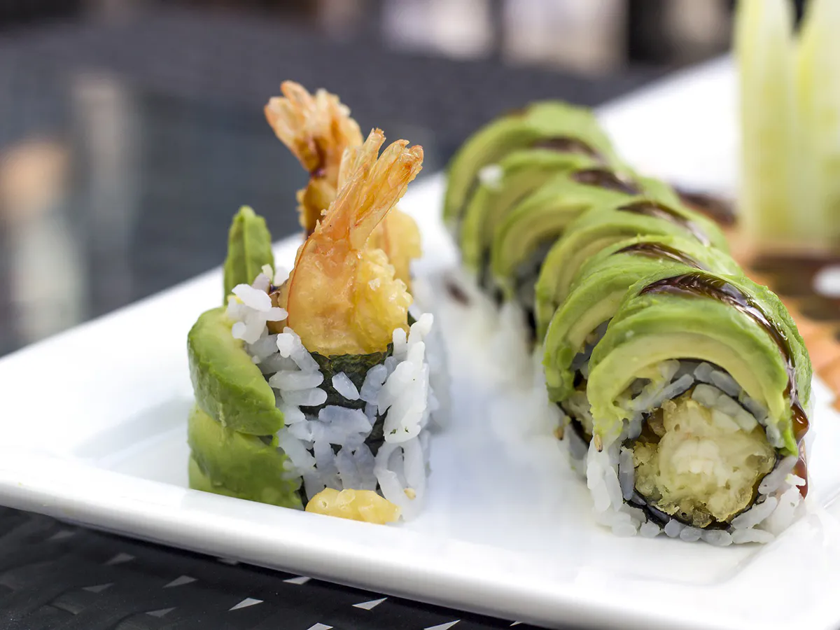 Tempura shrimp avocado sushi rolls on white plate at Hinoki Men, a Japanese Restaurant in Rancho Cucamonga